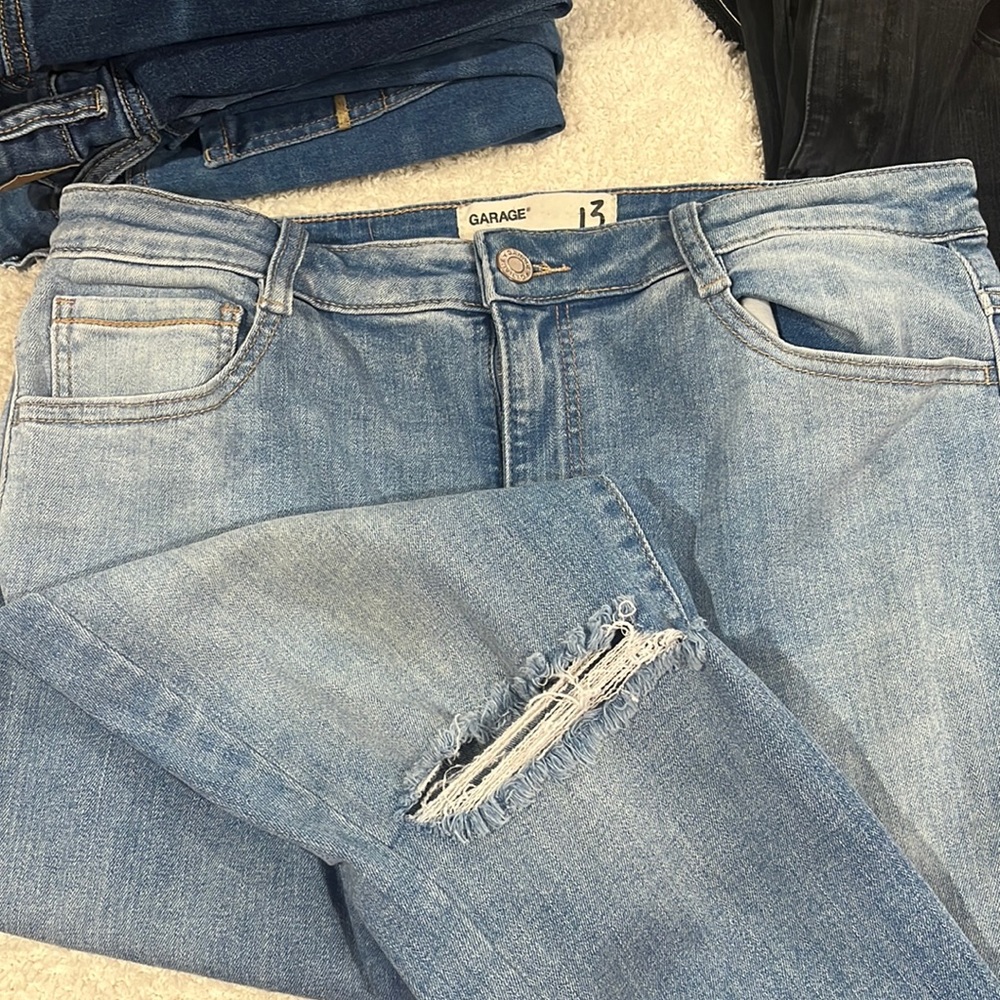 Light wash jeans from garage. Holes in knees
